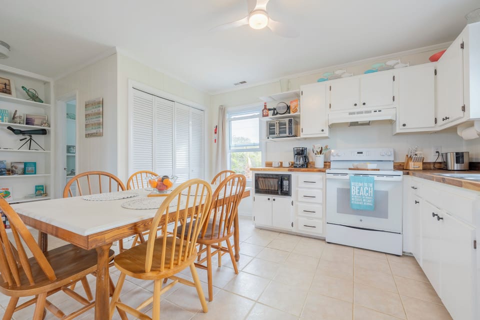 You'll actually look forward to cooking in this well-stocked, kitchen with butcher-block counter tops