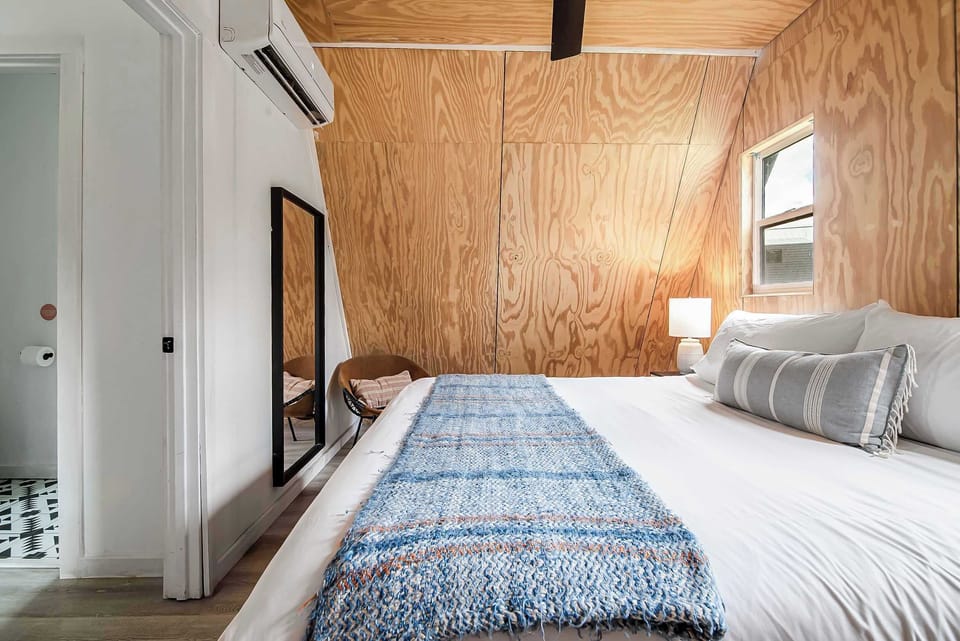 Sleep soundly in the comfy king bed (window shades have been installed for a deeper sleep). Ceiling fan adds additional coolness on warm summer nights.