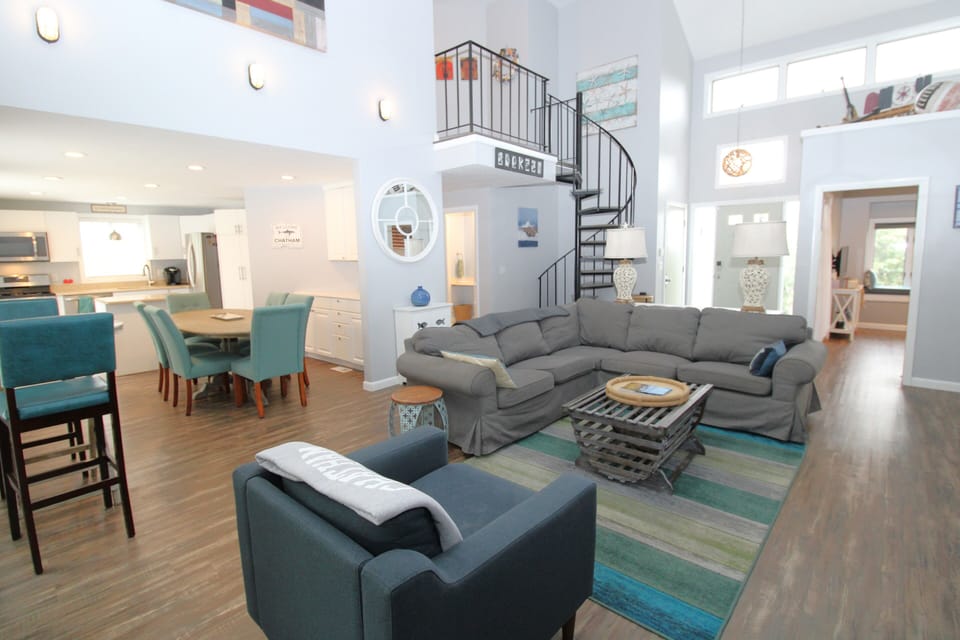 Family room with dining room and kitchen to the left