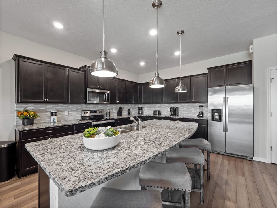 Full Size Kitchen with Basic Starter Essentials and Bar Stool Seating