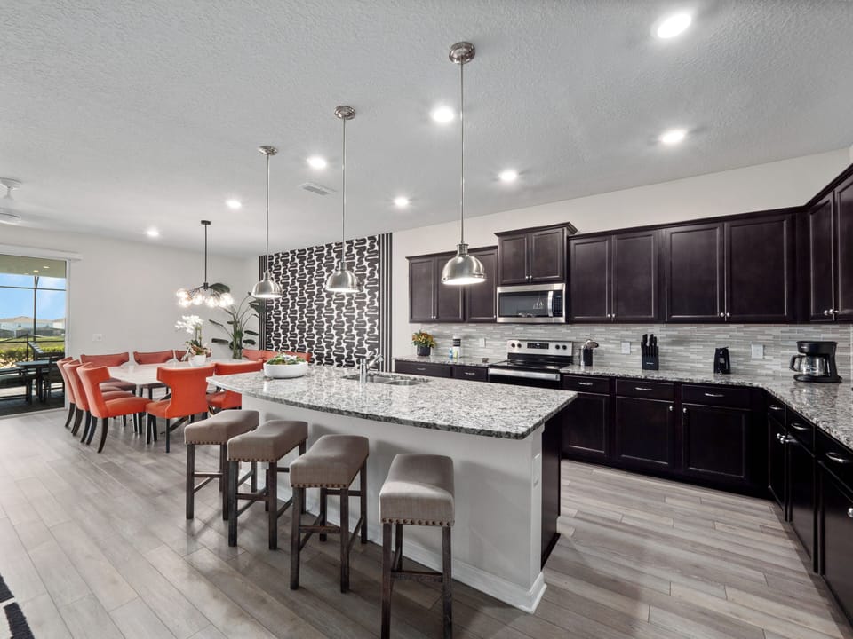 Full Size Kitchen with Basic Starter Essentials and Bar Stool Seating