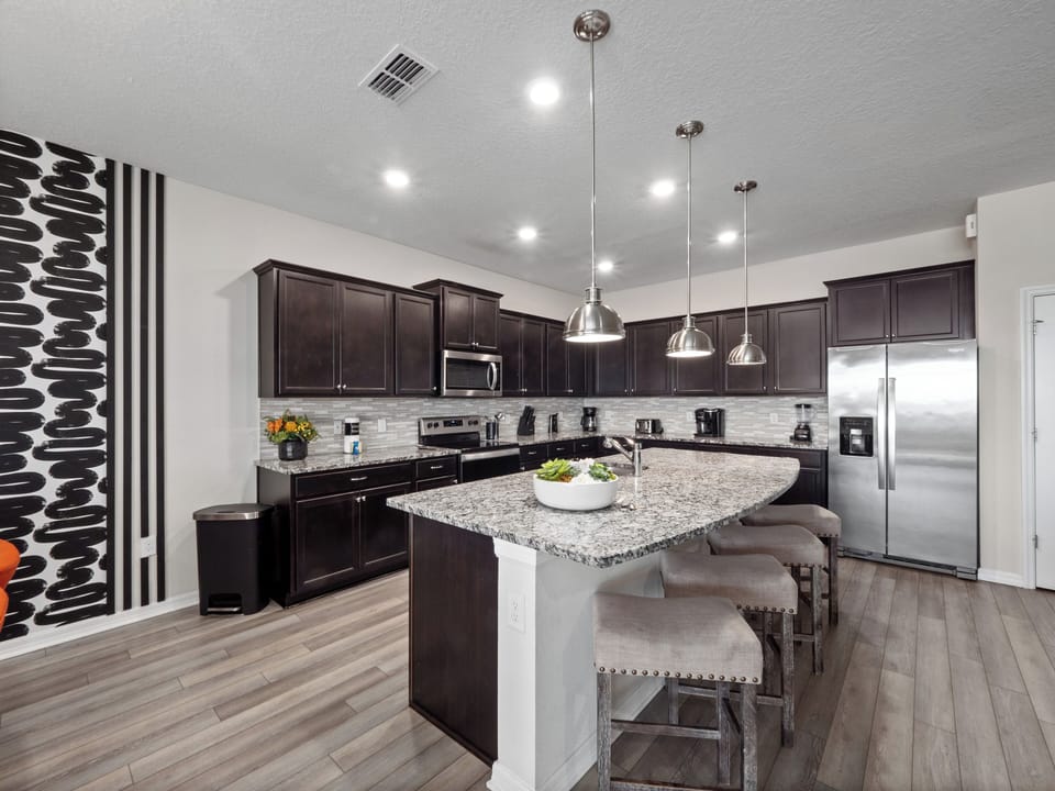 Full Size Kitchen with Basic Starter Essentials and Bar Stool Seating