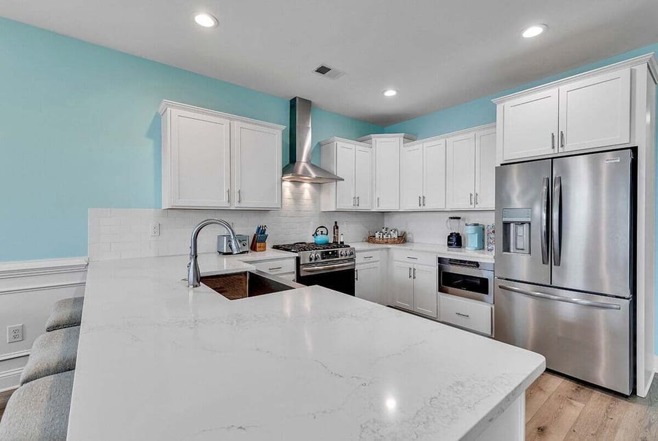 A large island offering prep space and casual seating.
