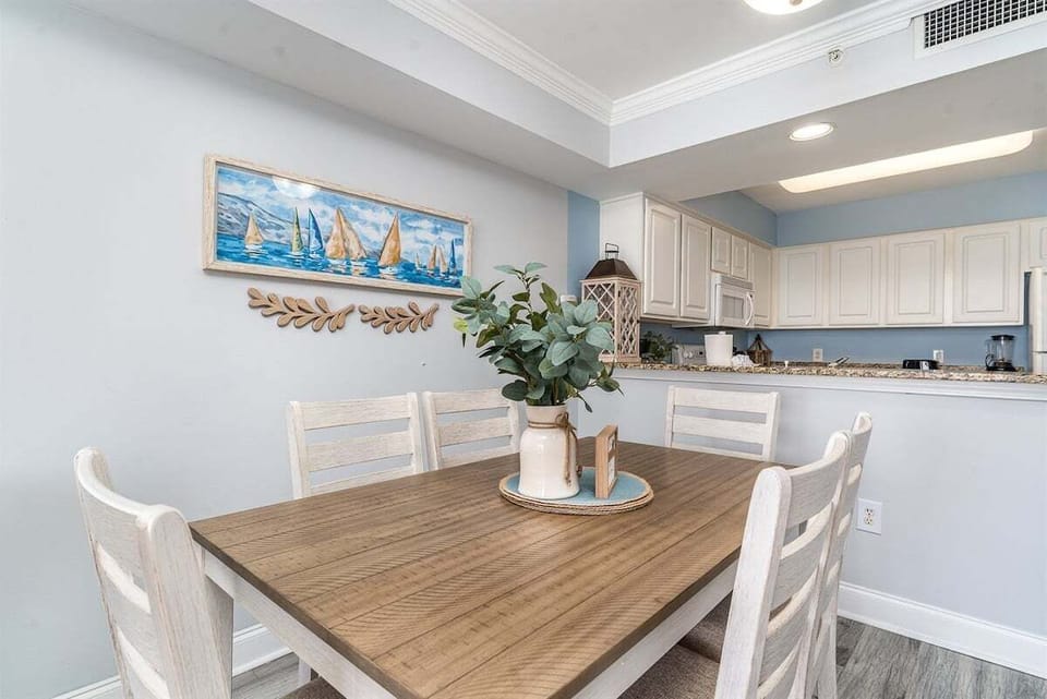 Dining table set for shared meals, conversation, and relaxed gatherings during your stay.