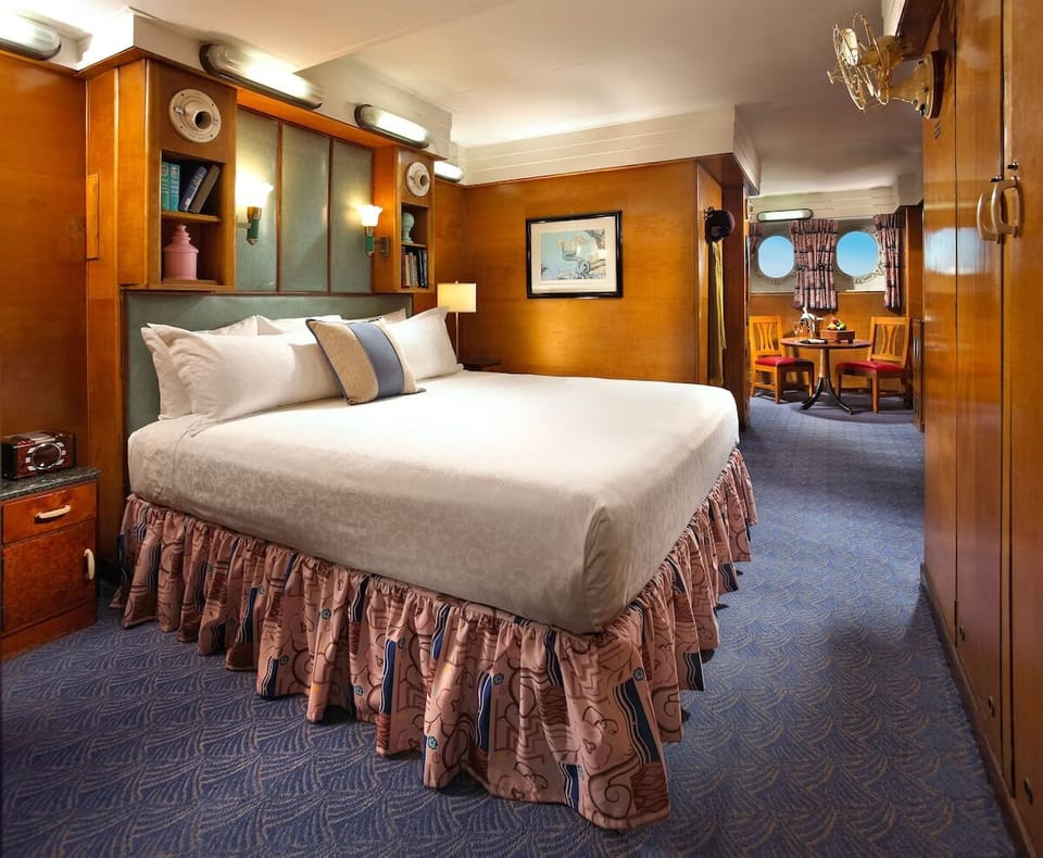Settle into crisp linens and enjoy a cozy in-room nook.