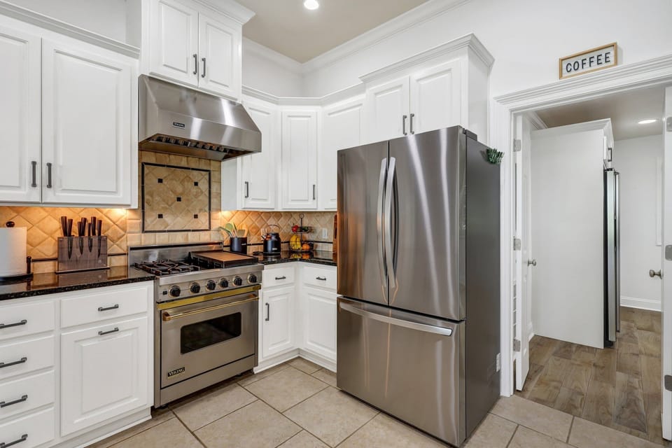 Gourmet kitchen with a gas stove and oven.