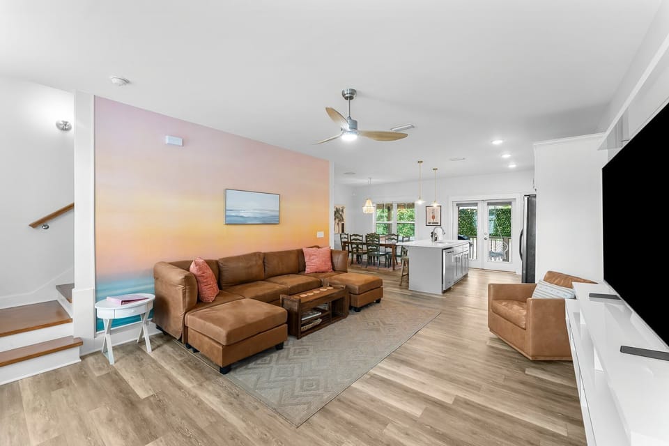 Spacious living room with a sectional and smart TV