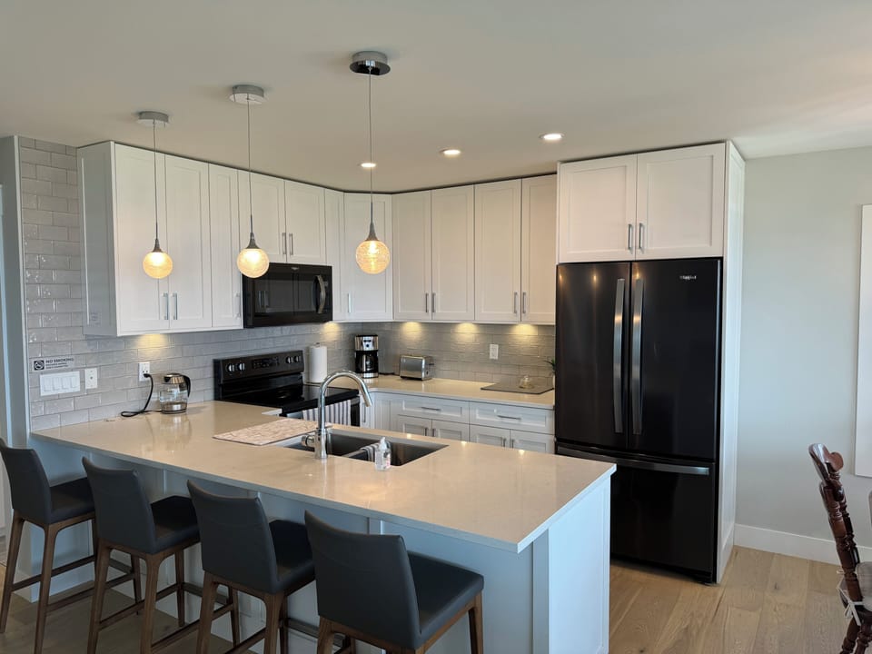 Fully equipped modern kitchen with island seating