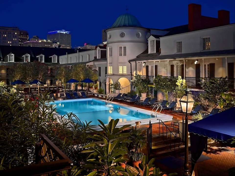 Soak up evening glamour with a serene, illuminated pool escape