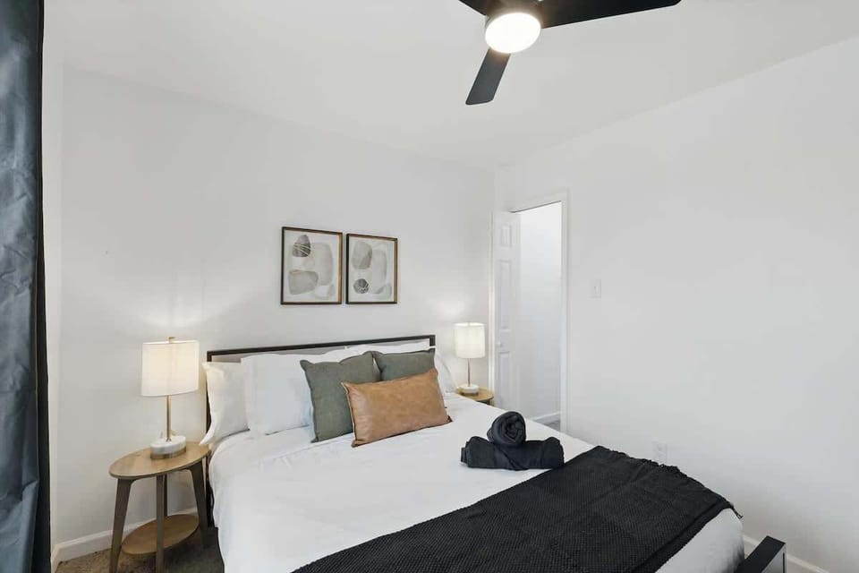 “Peaceful Queen Bedroom Retreat” Rest easy in this calming queen bedroom, featuring soft lighting, blackout curtains, and a sleek modern design — perfect for a good night’s sleep.
