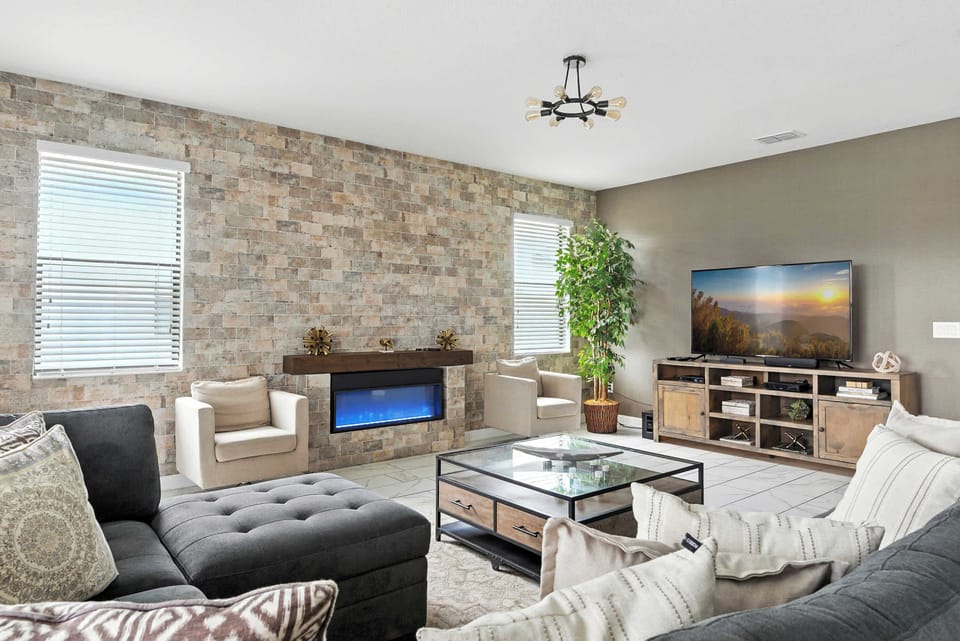 Stupendous and gorgeous family gathering, perfect blend of modern style with a Electric Fireplace emphasize comfort, functionality and practicality. The modern decoration has a sense of sophistication and elegance.