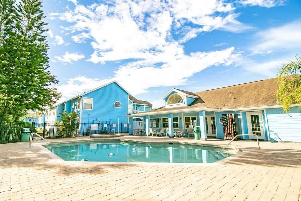 Inviting pool area with comfortable lounge chairs for relaxation.