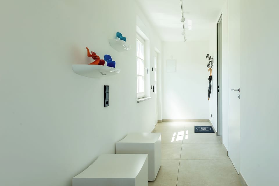 Bright Hallway with White Seating