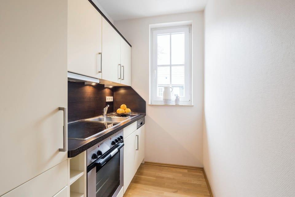 Kitchen with Modern Furniture and Window