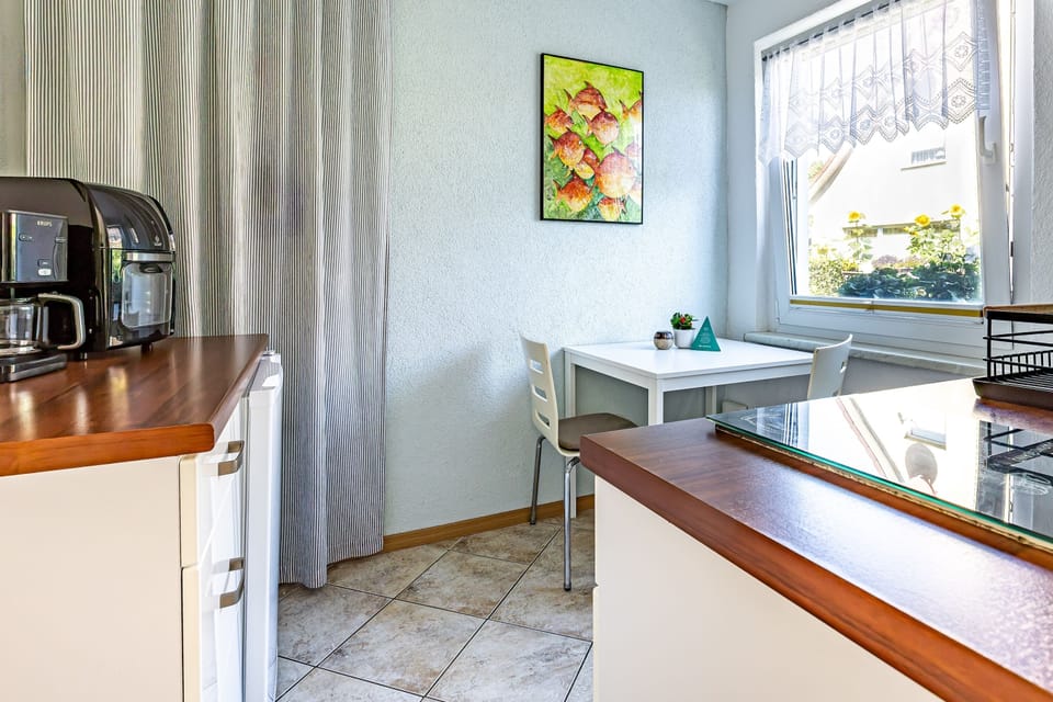 Modern Kitchen with Table and Chairs