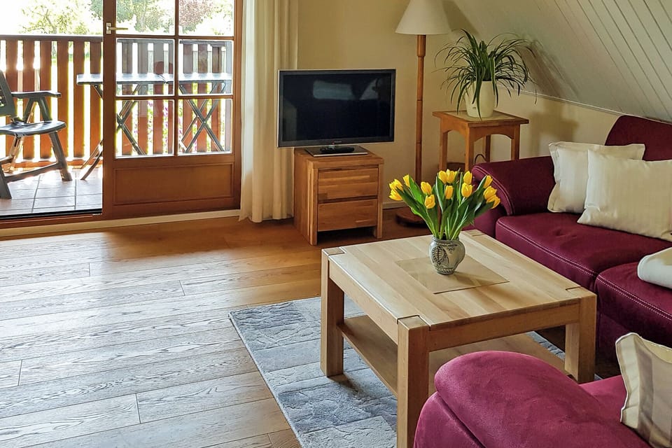 Cozy Living Room with Balcony View