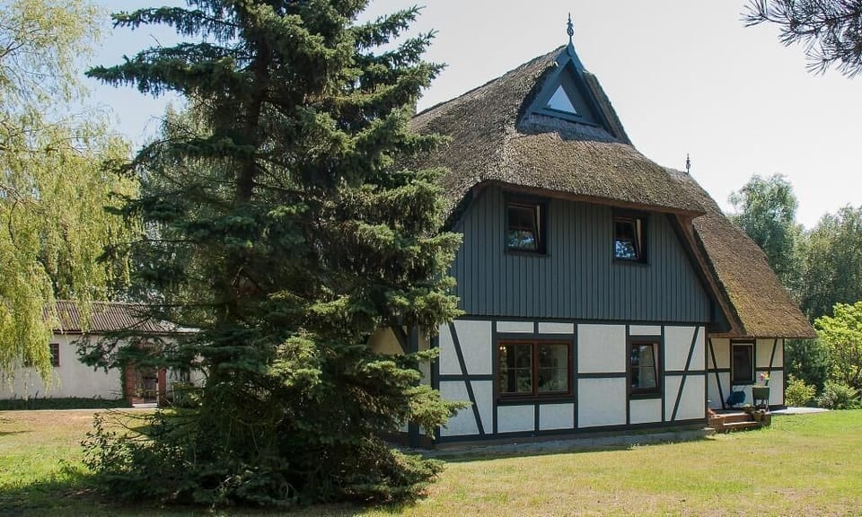 Exterior View of a House with Thatched Roof
