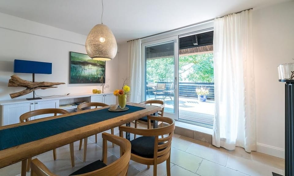 Modern Kitchen with Dining Area and Large Windows