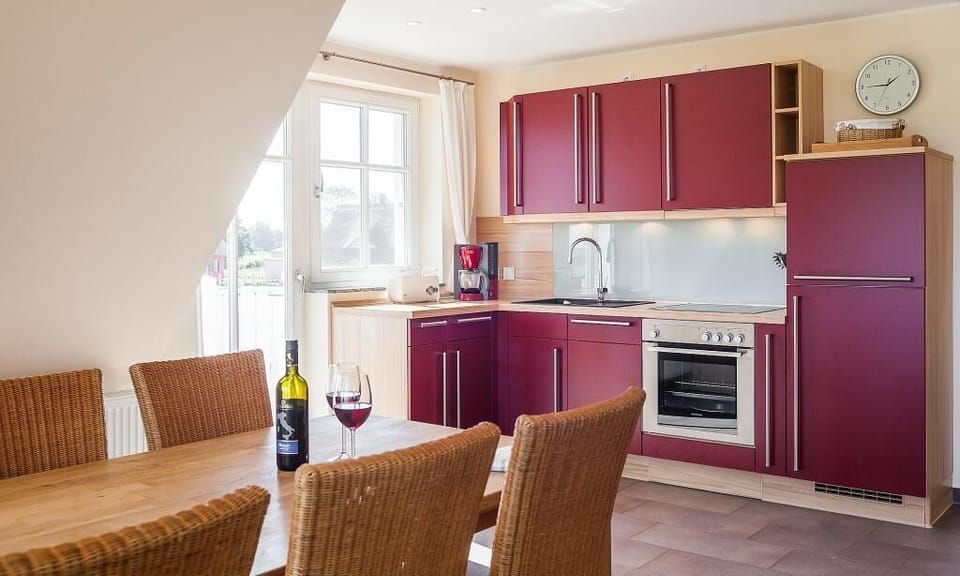 Modern Kitchen with Red Cabinets