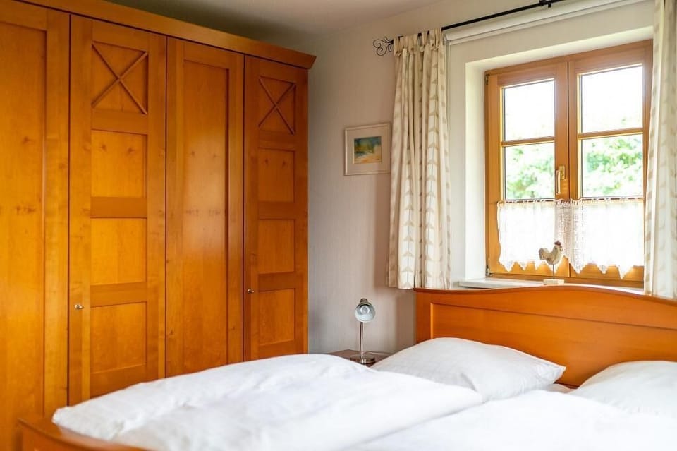 Cozy Bedroom with Wooden Wardrobe