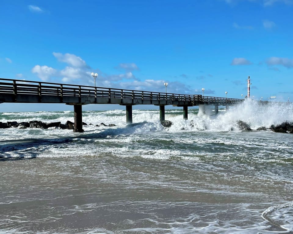 Pier with Waves at the Beach