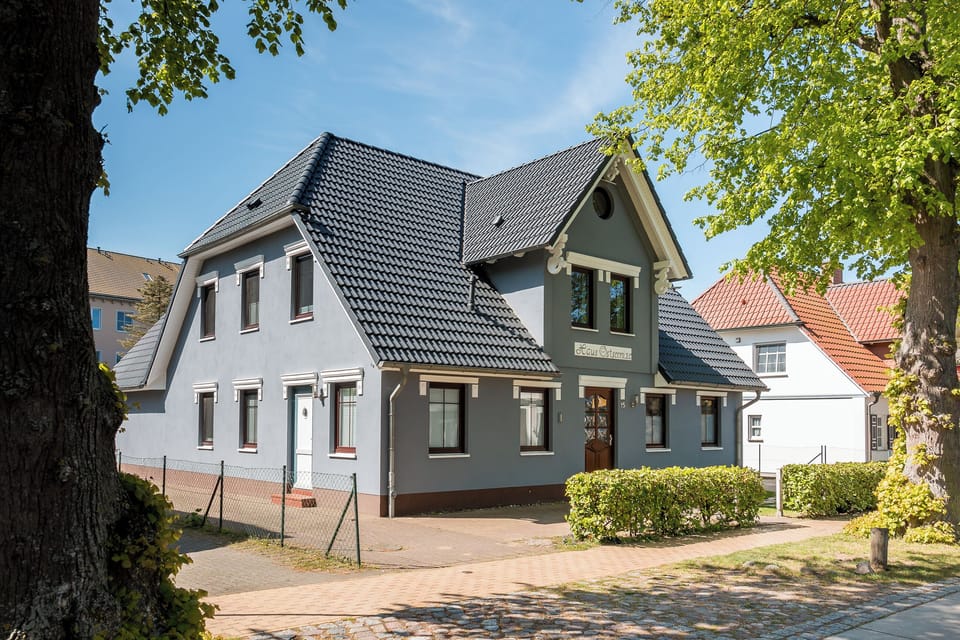 Main building with garden and modern architectural features