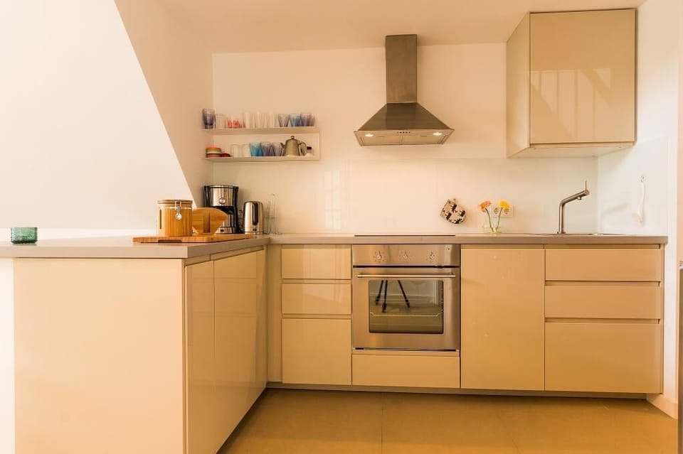 Modern kitchen with cooking area and oven