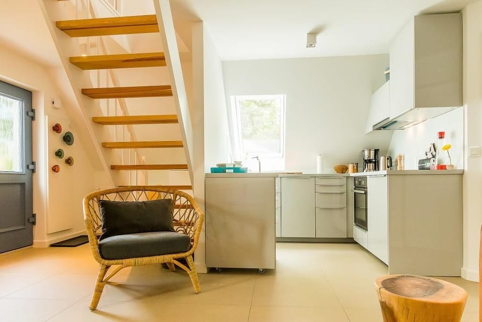 Modern Kitchen with View of the Stairs