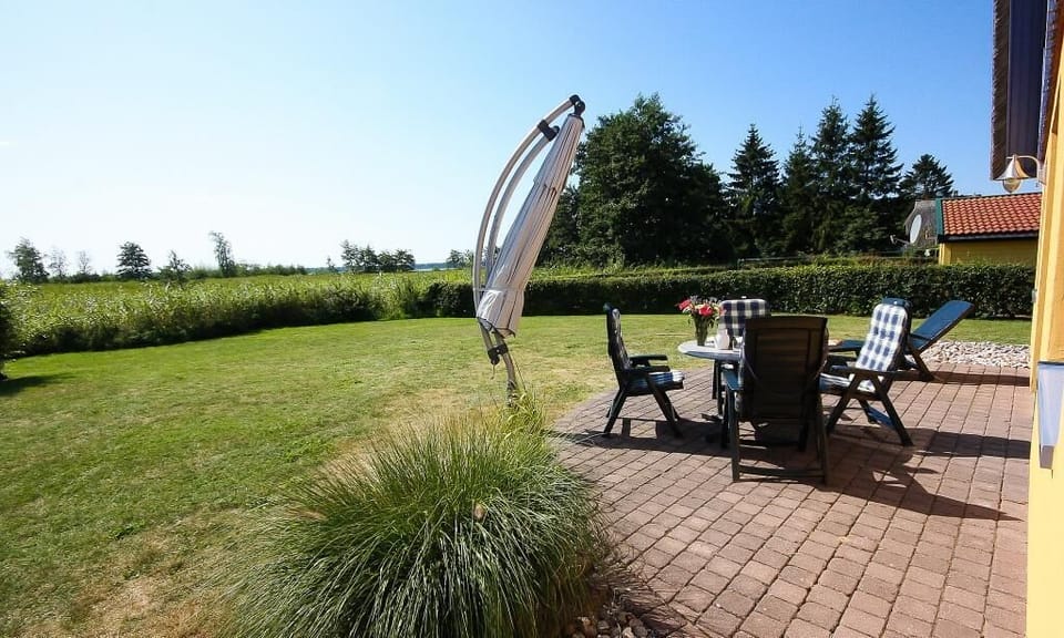 Terrace with Seating Area and Sunshade