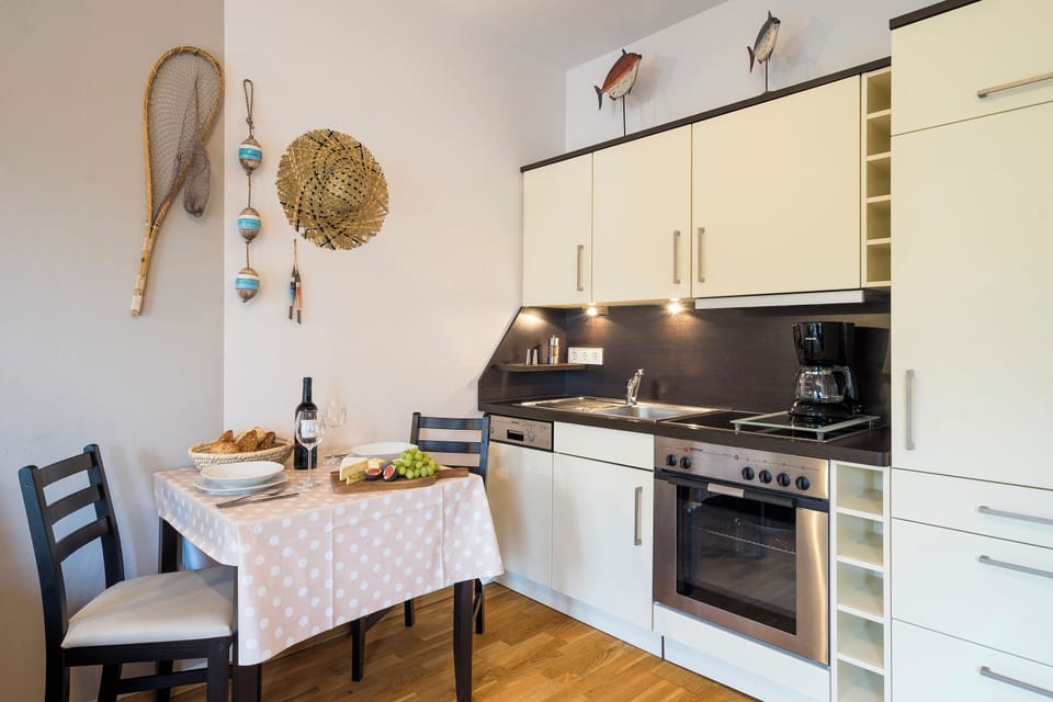 Kitchen with Table and Modern Appliances