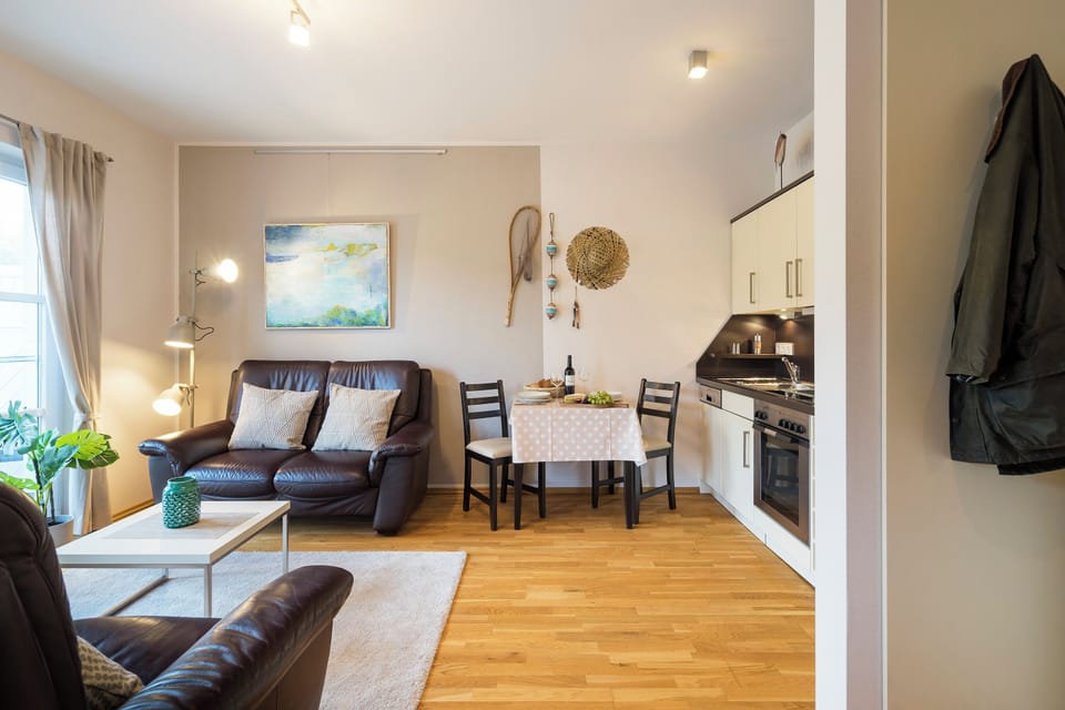 Cozy Living Space with Sofa and Dining Table