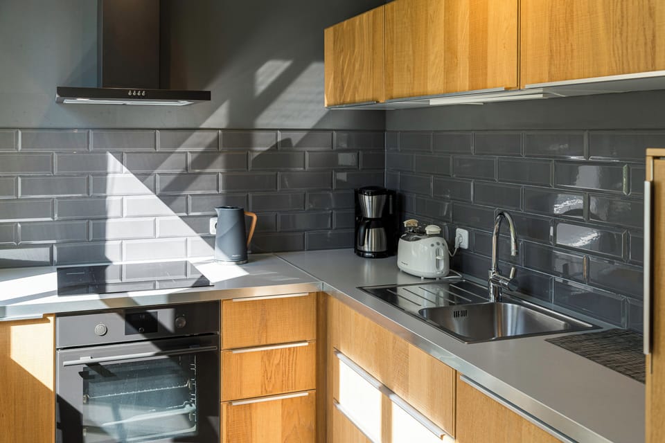 Modern Kitchen with Wooden Cabinets and Stainless Steel Appliances