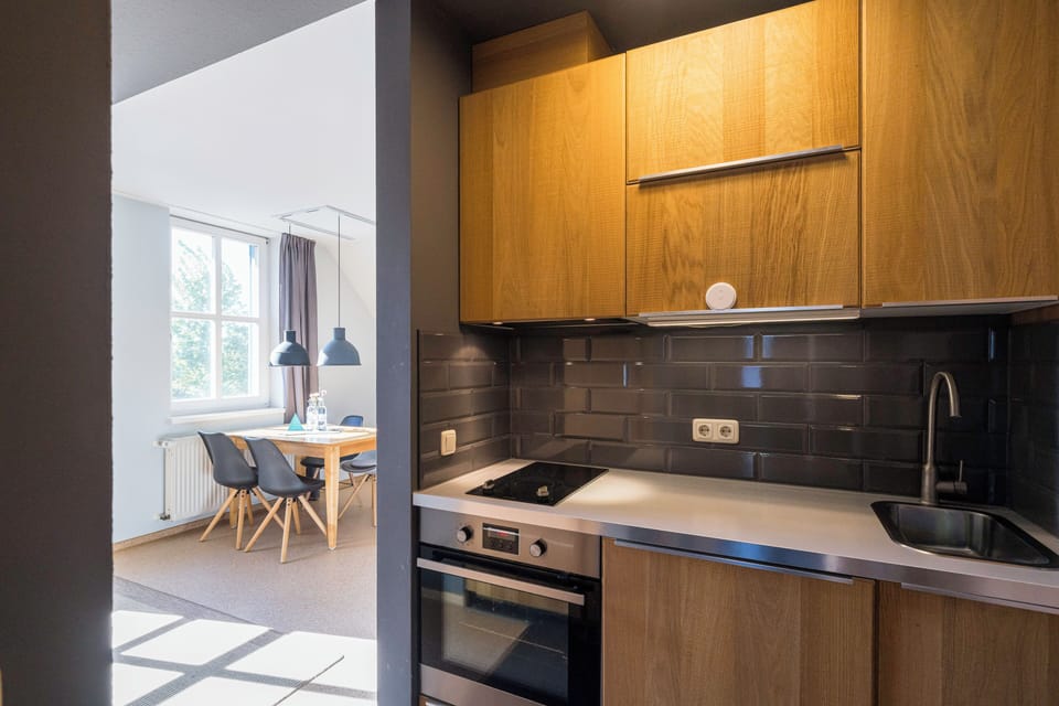 Modern Kitchen with Wooden Cabinets and Stove