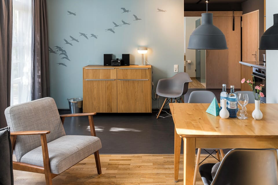 Cozy Living Room with Dining Table and Chairs