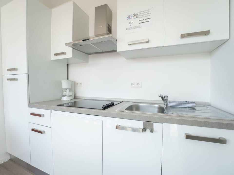 Kitchen, Countertop, Kitchen Appliance, Cabinetry, Major Appliance, Interior Design, Kitchen Sink, Wood, Flooring, Sink