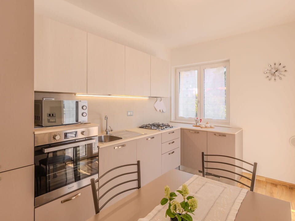 Interior Design, Flooring, Kitchen, Wood, Furniture, Countertop, Major Appliance, Room, Kitchen Appliance, Floor
