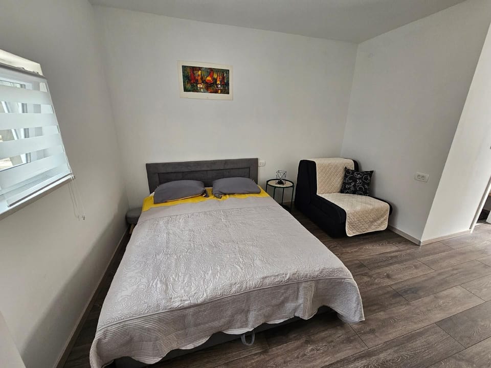 double bed and folding sofa chair for one person