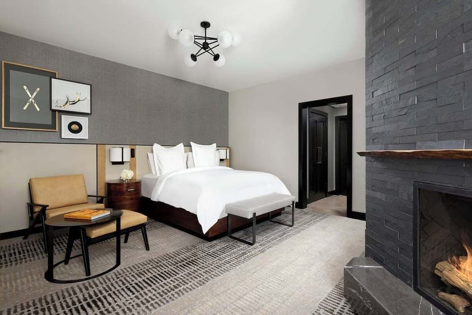 King Room offers gas fireplace, living area, separate soaking tub, mini-bar, desk, daily housekeeping, and more