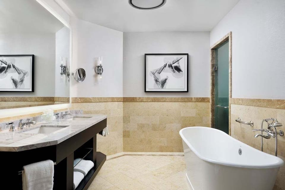 King Room offers gas fireplace, living area, separate soaking tub, mini-bar, desk, daily housekeeping, and more