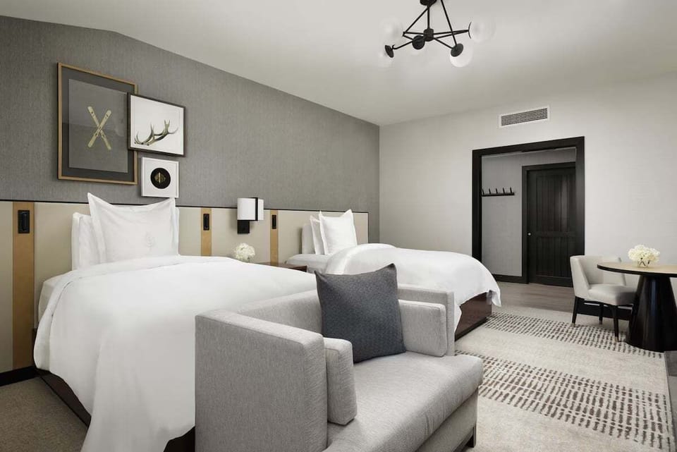 Two Double Room offers 2 Beds, Fireplace, Mini Bar, Separate Soaking Tub