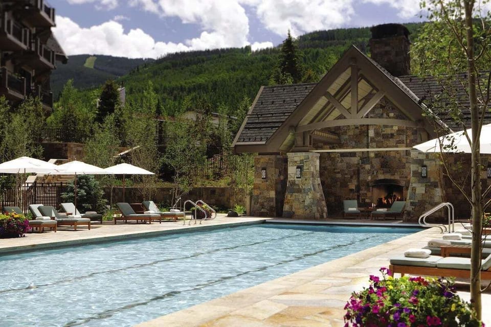 Onsite Hot Tub, Heated Pool, Cabanas and Outdoor Fireplace