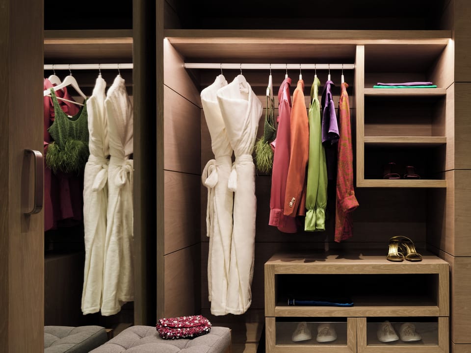 Refresh after the beach with robes and generous closet space.