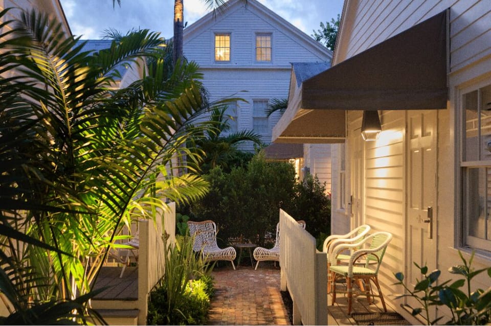 Sip evening cocktails in a lantern-lit courtyard hideaway.