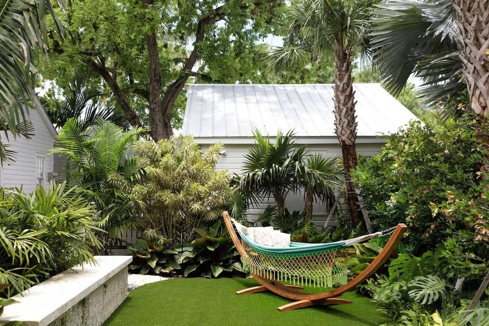 Sway in a hammock surrounded by vibrant, private tropical gardens.