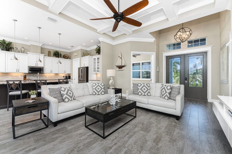 Spacious living room designed for comfort at Aqua Circle Tides House in Englewood, FL
