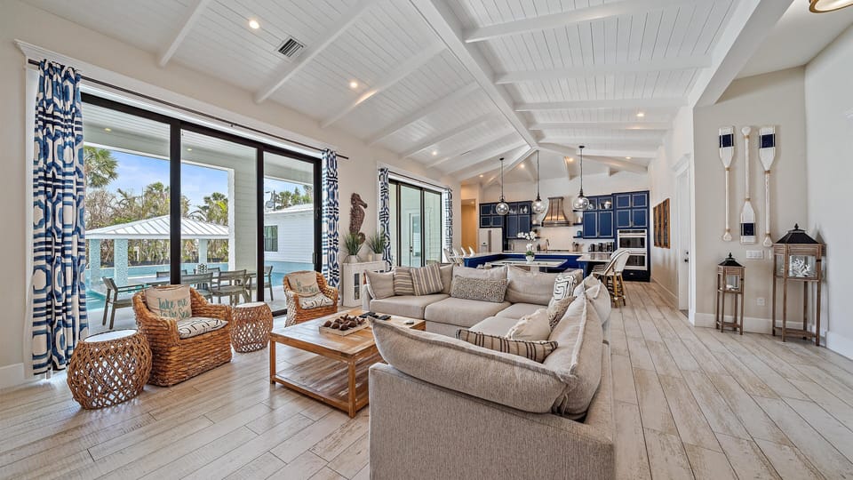 An open-concept living and dining area that accommodates up to 16 guests.