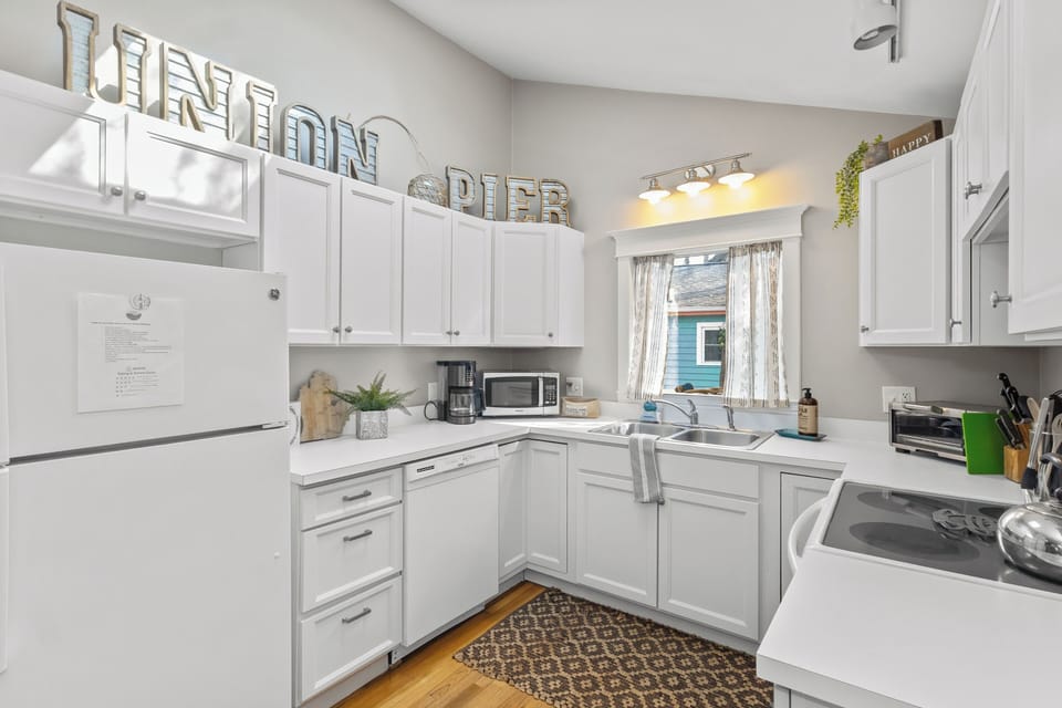 The bright kitchen features lots of storage space, making meal prep a breeze.