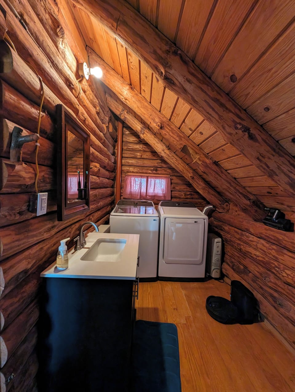 Half bathroom with washer dryer