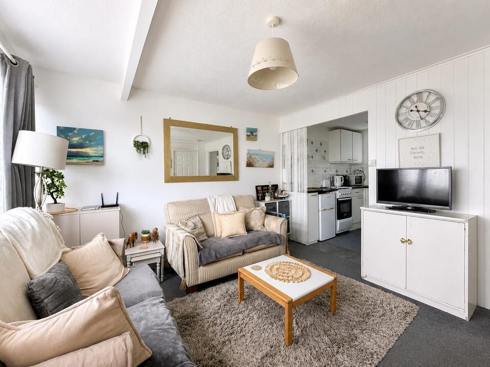 Comfortable lounge with stylish free-standing furniture throughout.