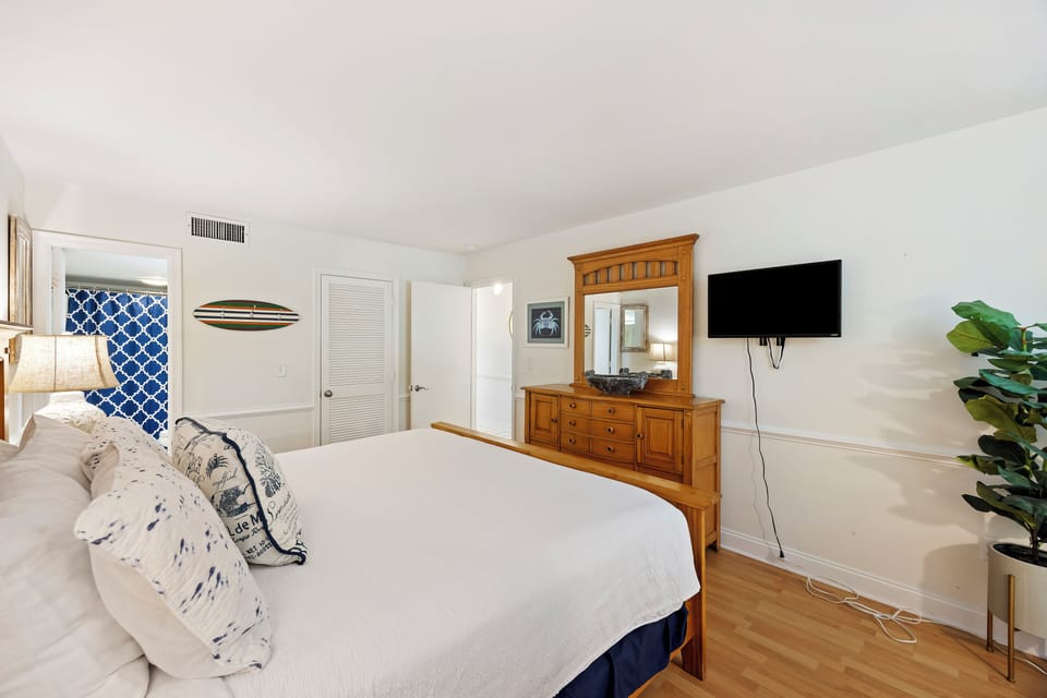 Bedroom with King Bed, TV, and Private Bathroom